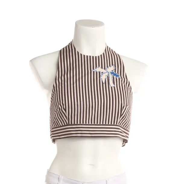 In alto, in Marrone, Cotone, Alémais