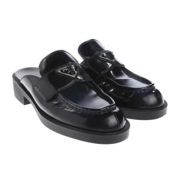 Mules, in Schwarz, Prada